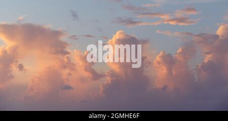 Beautiful colored cloudy evening sky. Sky with clouds at sunset. Abstract sky background. Stock Photo