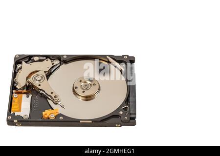 Close up view of disassembled hard drive isolated on white background. Stock Photo