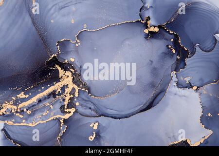 Luxury abstract fluid art painting background alcohol ink technique Blue and gold. Stock Photo
