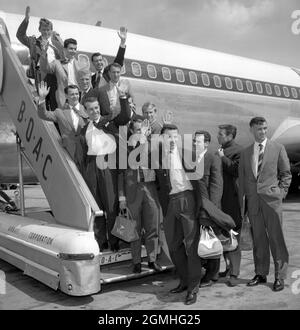 File photo dated 17-05-1962 of Their hopes soaring, England's World Cup footballers wave before leaving London Airport this morning (Thursday) for Chile and the World Cup series. They are due to return to this country in late June. From top: Gerry Hitchins, Stan Anderson, Johnny Haynes, Ron Flowers (left), Jimmy Greaves (right), Bobby Robson, Peter Swan, Ron Springett (face hidden), Bobby Charlton, Ray Wilson (face hidden), Jimmy Armfield, John Connolly, Alan Peacock and Bobby Smith. Issue date: Sunday September 19, 2021. Stock Photo
