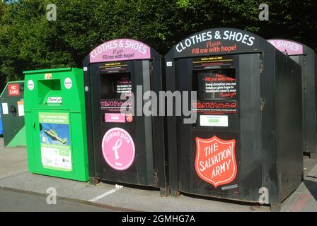 Clothes and Shoes Recycle Bins, Asda Car park, Portsmouth, Hampshire, UK. Stock Photo