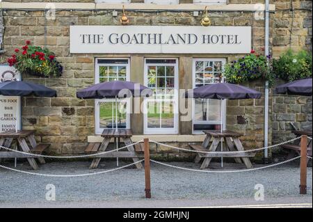 Nostalgic scene at the Goathland Hotel re-named the Aidensfield Arms for the TV serial programme Heartbeat set in the 1960's Stock Photo