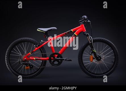 Sport mountain red bicycle isolated on black background Stock Photo