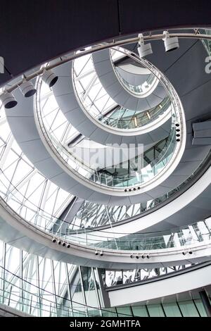 Helical staircase / walkway inside the City Hall building in London Bridge, Southwark, London, UK Stock Photo