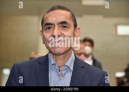 17 September 2021, North Rhine-Westphalia, Cologne: Medical scientist Ugur Sahin - Cologne honors the Biontech founders in the city hall. The two researchers sign the city's Golden Book and the University of Cologne awards them an honorary doctorate. Photo: Horst Galuschka/dpa Stock Photo