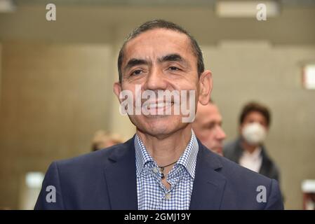 17 September 2021, North Rhine-Westphalia, Cologne: The physician Ugur Sahin - near Cologne honors the Biontech founders in the city hall. The two researchers sign the city's Golden Book and the University of Cologne awards them an honorary doctorate. Photo: Horst Galuschka/dpa Stock Photo