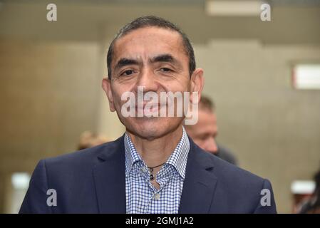 17 September 2021, North Rhine-Westphalia, Cologne: Medical scientist Ugur Sahin - Cologne honors the Biontech founders in the city hall. The two researchers sign the city's Golden Book and the University of Cologne awards them an honorary doctorate. Photo: Horst Galuschka/dpa Stock Photo