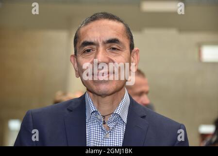 17 September 2021, North Rhine-Westphalia, Cologne: Medical scientist Ugur Sahin - Cologne honors the Biontech founders in the city hall. The two researchers sign the city's Golden Book and the University of Cologne awards them an honorary doctorate. Photo: Horst Galuschka/dpa Stock Photo