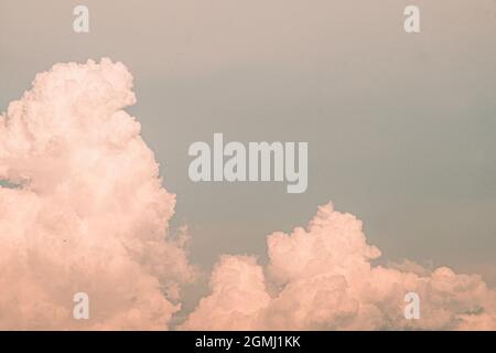 Beautiful white fluffy clouds sky background abstract season and weather. Stock Photo