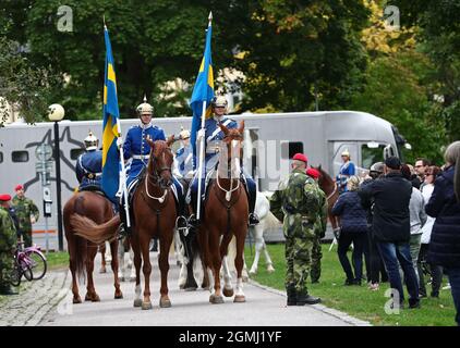 Linköping, Sweden. 19th, September, 2021. The Royal Swedish Cavalry Band with horses from the Association for the Mounted Guard conducts a riding parade through Linköping city on Sunday. The Royal Swedish Cavalry Band is one of three professional military bands in the Swedish Armed Forces. The band traces its ancestry back to the 1500s when King Gustav Vasa raised his first regiment of horse. Today the Royal Swedish Cavalry Band is one of few mounted bands in the world. Credit: Jeppe Gustafsson/Alamy Live News Stock Photo