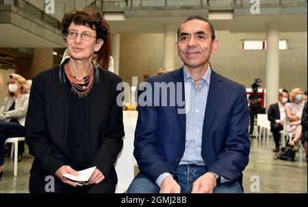 17 September 2021, North Rhine-Westphalia, Cologne: The physician Ugur Sahin - near Cologne honors the Biontech founders in the city hall. The two researchers sign the city's Golden Book and the University of Cologne awards them an honorary doctorate. Photo: Horst Galuschka/dpa Stock Photo