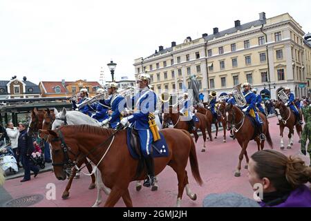 Linköping, Sweden. 19th, September, 2021. The Royal Swedish Cavalry Band with horses from the Association for the Mounted Guard conducts a riding parade through Linköping city on Sunday. The Royal Swedish Cavalry Band is one of three professional military bands in the Swedish Armed Forces. The band traces its ancestry back to the 1500s when King Gustav Vasa raised his first regiment of horse. Today the Royal Swedish Cavalry Band is one of few mounted bands in the world. Credit: Jeppe Gustafsson/Alamy Live News Stock Photo