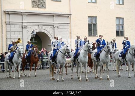 Linköping, Sweden. 19th, September, 2021. The Royal Swedish Cavalry Band with horses from the Association for the Mounted Guard conducts a riding parade through Linköping city on Sunday. The Royal Swedish Cavalry Band is one of three professional military bands in the Swedish Armed Forces. The band traces its ancestry back to the 1500s when King Gustav Vasa raised his first regiment of horse. Today the Royal Swedish Cavalry Band is one of few mounted bands in the world. Credit: Jeppe Gustafsson/Alamy Live News Stock Photo