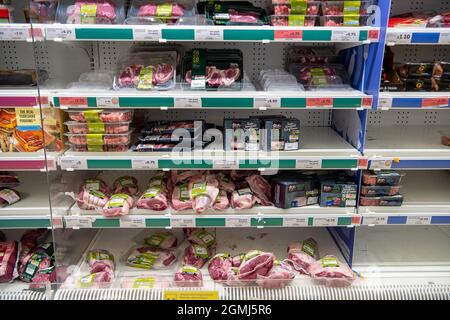 Taplow, UK. 19th September, 2021. The meat isle including lamb. Sainsbury's Supermarket had a good supply of food in their store today. Some lines are still being impacted upon by supply chain issues including bottled water and carbonated drinks such as cola due a shortage of carbon dioxide. This may lead to meat running short in supermarkets as animals are stunned before being slaughtered using carbon dioxide. Credit: Maureen McLean/Alamy Live News Stock Photo