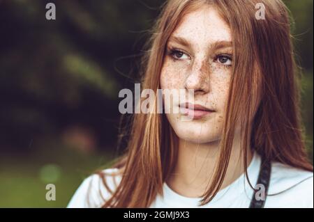 Close-up portrait of young teen freckled ginger girl Stock Photo