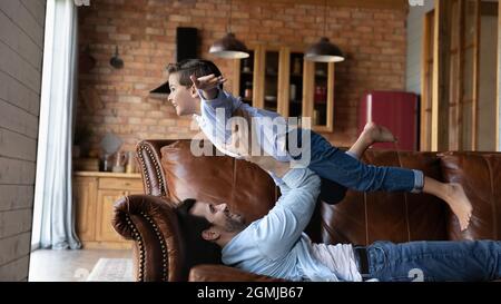 child pretending to be strong man Stock Photo - Alamy