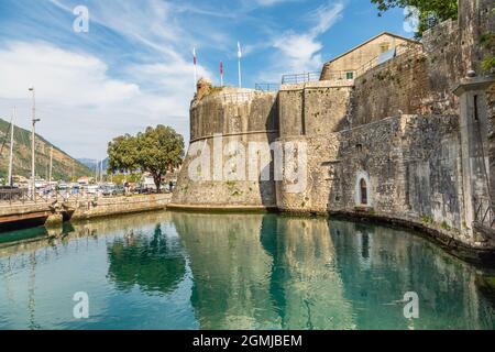 Gurdic tower medieval fortress walls with mountains in the background, Kotor Bay, Montenegro Stock Photo