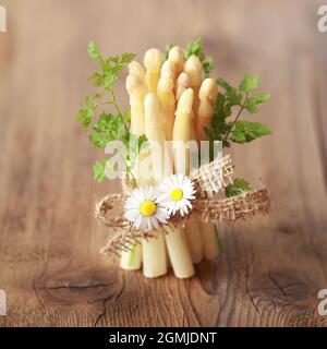 white asparagus on wooden table Stock Photo