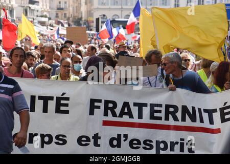 Marseille, France. 18th Sep, 2021. A protester holds a placard during ...