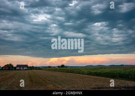 Dramatic looking sky as the first clouds accompanying a severe thunderstorm pass over the observer Stock Photo