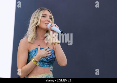Newport, UK. 19th Sep, 2021. English television personality and singer, songwriter Megan Elizabeth McKenna, who appeared on reality TV shows Celebrity Big Brother and The Only Way Is Essex performs live on stage at the Isle of Wight festival. (Photo by Dawn Fletcher-Park/SOPA Images/Sipa USA) Credit: Sipa USA/Alamy Live News Stock Photo