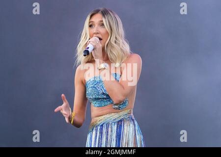 Newport, UK. 19th Sep, 2021. English television personality and singer, songwriter Megan Elizabeth McKenna, who appeared on reality TV shows Celebrity Big Brother and The Only Way Is Essex performs live on stage at the Isle of Wight festival. Credit: SOPA Images Limited/Alamy Live News Stock Photo