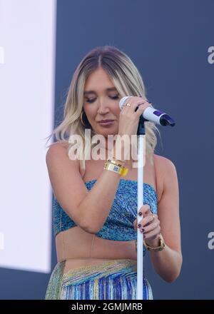 Newport, UK. 19th Sep, 2021. English television personality and singer, songwriter Megan Elizabeth McKenna, who appeared on reality TV shows Celebrity Big Brother and The Only Way Is Essex performs live on stage at the Isle of Wight festival. Credit: SOPA Images Limited/Alamy Live News Stock Photo