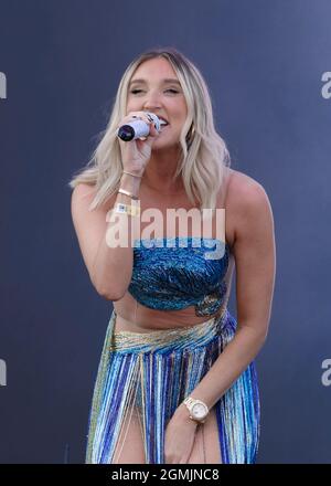 Newport, UK. 19th Sep, 2021. English television personality and singer, songwriter Megan Elizabeth McKenna, who appeared on reality TV shows Celebrity Big Brother and The Only Way Is Essex performs live on stage at the Isle of Wight festival. (Photo by Dawn Fletcher-Park/SOPA Images/Sipa USA) Credit: Sipa USA/Alamy Live News Stock Photo