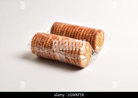 Crackers biscuit packed on white background Stock Photo