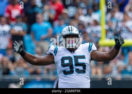 Carolina Panthers defensive tackle Derrick Brown (95) encourages the crowd  to get loud during an NFL football game against the Atlanta Falcons,  Thursday, Nov. 10 2022, in Charlotte, N.C. (AP Photo/Brian Westerholt