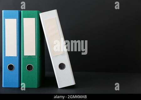 Office folders on dark background Stock Photo