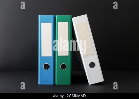 Office folders on dark background Stock Photo