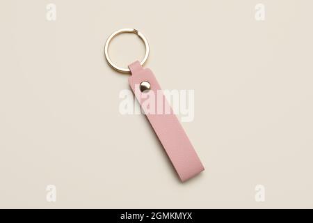 Leather keychain on light background Stock Photo