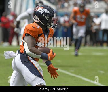 September 18, 2022: Denver Broncos running back Javonte Williams (33)  hurdles Houston Texans cornerback Desmond King II (25) in the football game  between the Denver Broncos and Houston Texans at Empower Field Field in  Denver, CO. Denver hung