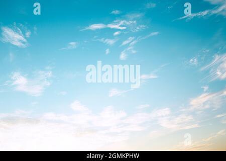 Bright blue sky with the white clouds Stock Photo