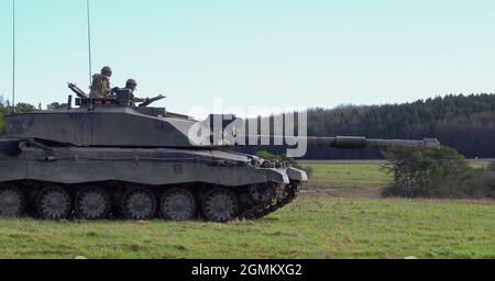 close up action shot of a British Army Challenger 2 FV4034 Main Battle Tank on a military exercise, Salisbury Plain, Wiltshire UK Stock Photo