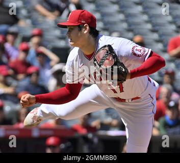 Oakland Athletics starting pitcher Homer Bailey wipes his chin after ...