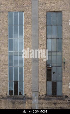 broken windows in an old ruined factory Stock Photo