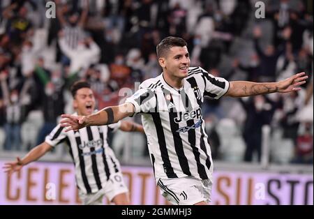 Turin, Italy. 19th Sep, 2021. FC Juventus' Alvaro Morata celebrates his goal during a Serie A football match between FC Juventus and AC Milan in Turin, Italy, on Sept. 19, 2021. Credit: Federico Tardito/Xinhua/Alamy Live News Stock Photo