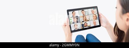 Video conference with multiple employees. Tablet application for remote work and study from home. Stock Photo