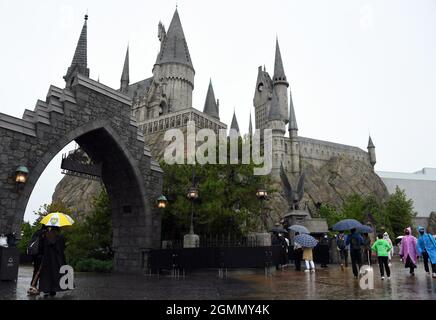 Beijing, China. 20th Sep, 2021. Tourists visit the Wizarding World of Harry Potter at the Universal Beijing Resort in Beijing, capital of China, Sept. 20, 2021. The Universal Beijing Resort, currently the largest in scale worldwide, opened to the public on Monday. The resort, covering 4 square km, includes the highly anticipated Universal Studios Beijing theme park, the Universal CityWalk, and two hotels. Credit: Ren Chao/Xinhua/Alamy Live News Stock Photo