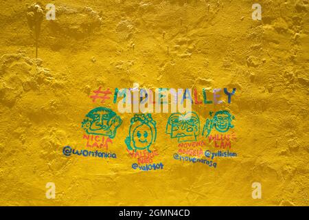 Close up of a wall mural drawing on a yellow wall Stock Photo