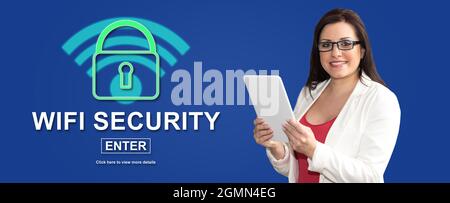 Woman using digital tablet with wifi security concept on background Stock Photo