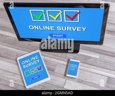 Online survey concept shown on different information technology devices Stock Photo