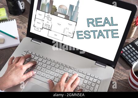 Real estate concept shown on a laptop screen Stock Photo