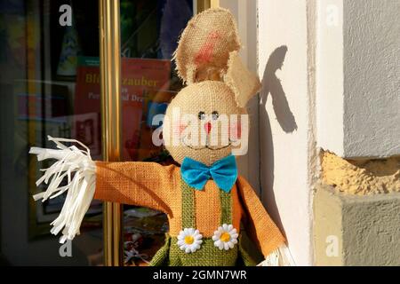 Easter bunny in front of a shop, Austria Stock Photo