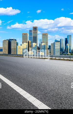 Asphalt road and modern city commercial buildings in Beijing,China. Stock Photo