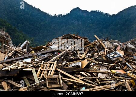 flood disaster 2021 Ahrtal, Ahr valley, rubble and rubish in front of Ahr montains, Germany, Rhineland-Palatinate, Eifel, Bad Neuenahr-Ahrweiler Stock Photo