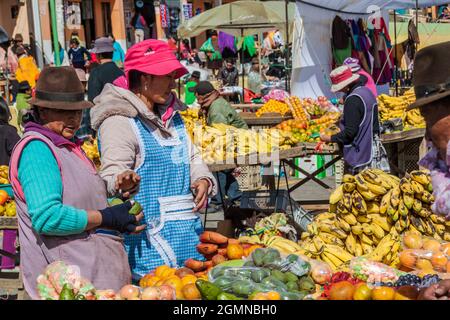 ZUMBAHUA, ECUADOR - JULY 4, 2015: View of a traditional Saturday market in a remote village Zumbahua Stock Photo