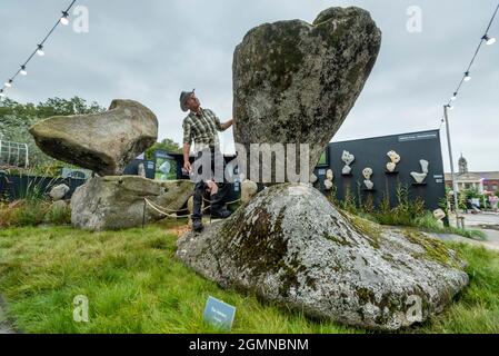 London, UK.  20 September 2021. Adrian Gray Stonebalancing at the RHS Chelsea Flower Show. Cancelled due to Covid-19 concerns last year, this is the first time that the show has been held in September (usually May).  The show runs to 26 September at the Royal Hospital Chelsea.  Credit: Stephen Chung / Alamy Live News Stock Photo